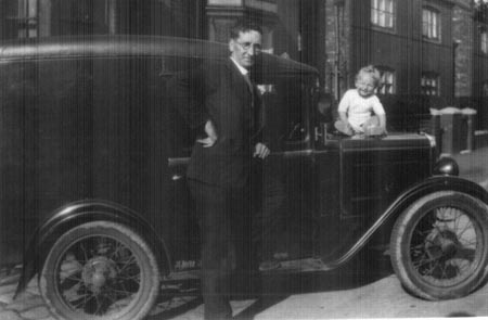 John Boyer outside his shop in Knowsley Road in 1934